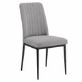 Silla de comedor tapizada de tejido gris con estructura de acero negro y respaldo acanalado 48 x 55 x 85 cm